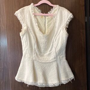 Edgy leather and cotton designer peplum top